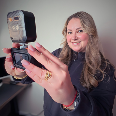 Olena with her filming equipment and setup